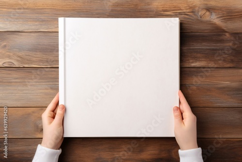 Book Mockup in Kid's Hands Holding Top View on Wood Table Background Children's Book Scene Mockup