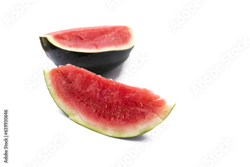 A watermelon cut out, isolated on a white background. A juicy summer watermelon, with its refreshing red flesh, ready to quench thirst and satisfy the senses on a sunny day.