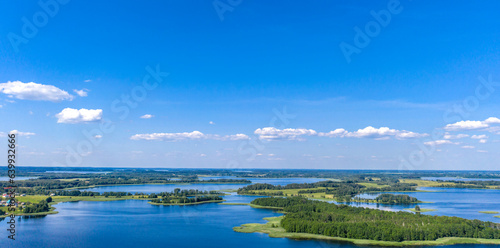 Drone shot on summer lake. Bird-eye view on summer lake. 