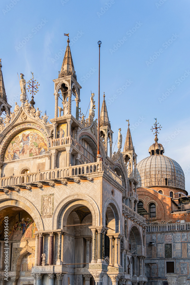 Architectural detail with the facade of Saint Marks Basilica in Venice, Italy.,