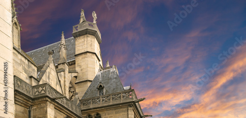 Great gothic church of Saint Germain l Auxerrois (against the background of a sky at sunset), Paris, France