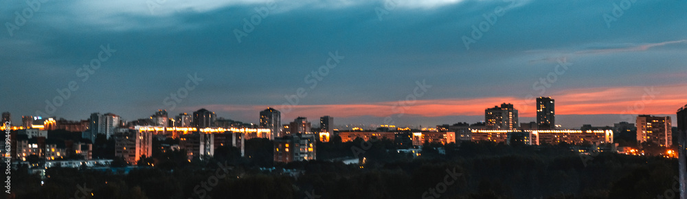 Night city with illumination,Banner panorama of night swooshing city Night city with illumination,Banner panorama of night swooshing city