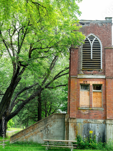 Abandon schoolhouse in Washington State with keep out sign photo