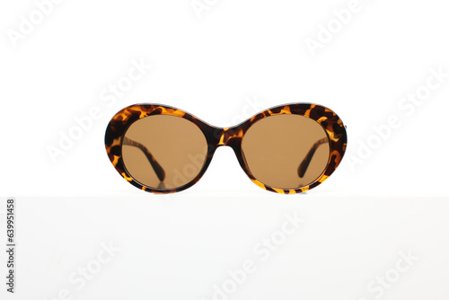 Fashionable leopard sunglasses isolated on white background