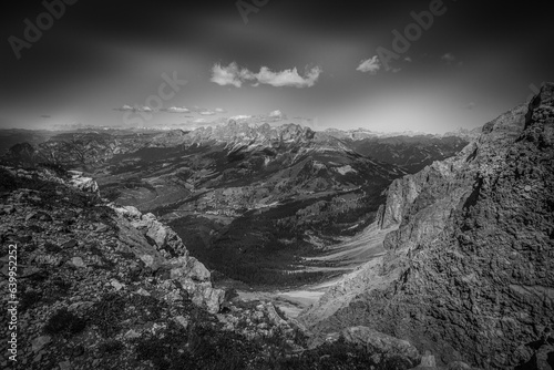 Black and white view from Latemar northern slope of famous Dolomites mountain peaks, Catinaccio,, Marmolada, Sella and Sciliar massifs, Trentino, South Tyrol, Italy. Awesome mountain panorama