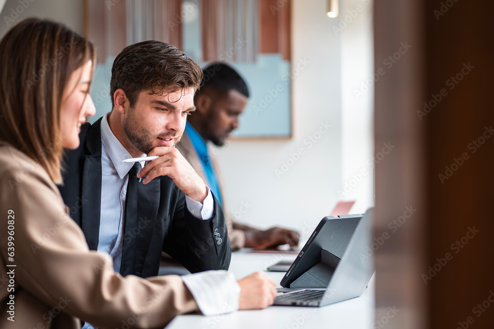 Male mature caucasian ceo businessman leader with diverse coworkers team executive managers group meeting. Multicultural professional businesspeople working together on research plan boardroom. Male mature caucasian ceo businessman leader with diverse coworkers team executive managers group meeting. Multicultural professional businesspeople working together on research plan boardroom.