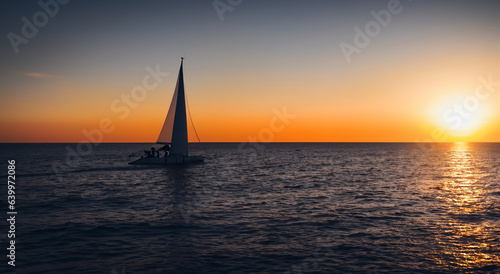 majestic sailboats on the sea with a beautiful sunset in high resolution and high sharpness