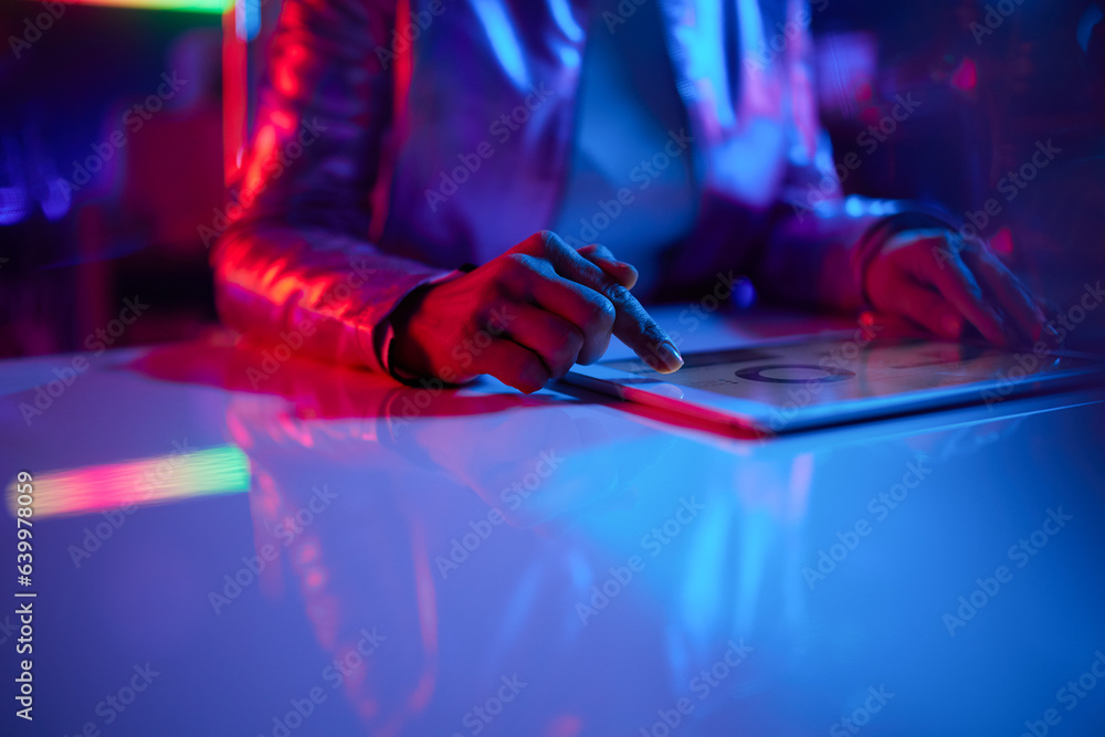 Closeup on female with tablet PC in office