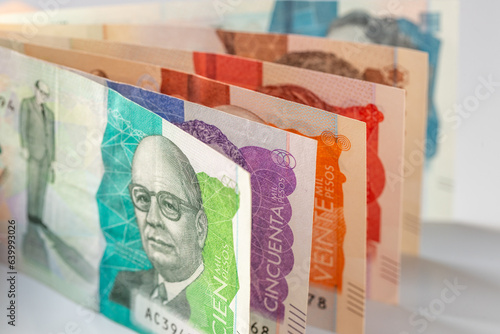 Obraz na płótnie Colombia money, Colombian pesos, Stacked various banknotes, 10 thousand pesos banknote, Financial and business concept, close up w salonie