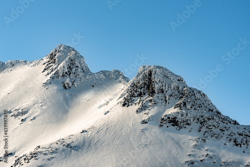 Sylarna mountains in Sweden in sun. Pointed mountains in Sweden. It was a cold winterday in March 2023. photo