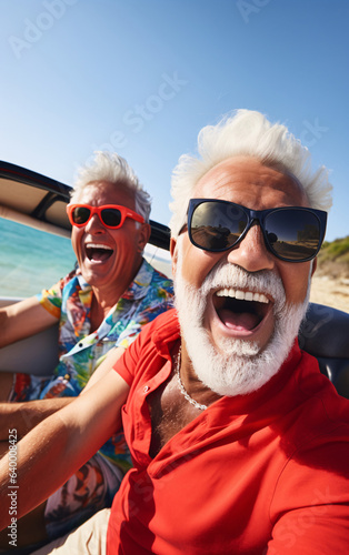 Older gay couple having fun together on vacation by traveling in a convertible
