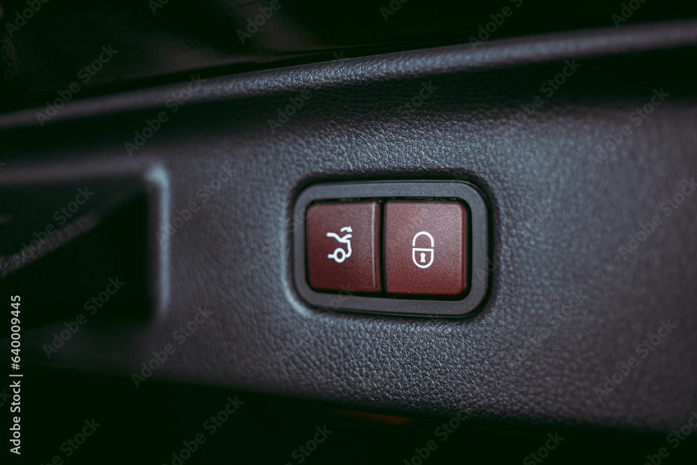 Closeup of the trunk release button. modern car interior. Automatically opening and closing the