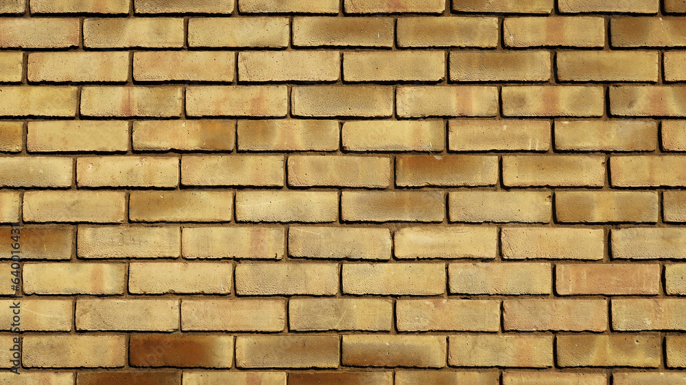 Fototapeta premium Patterned grunge brick wall texture background yellow