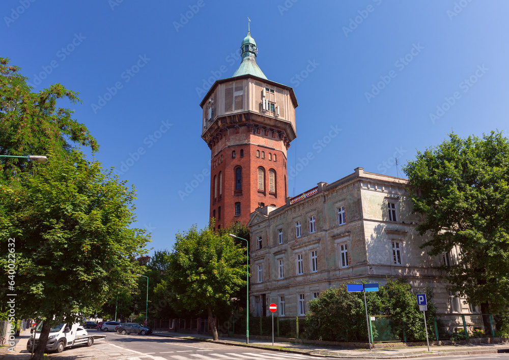 Old brick water tower in Swidnica on a sunny day.