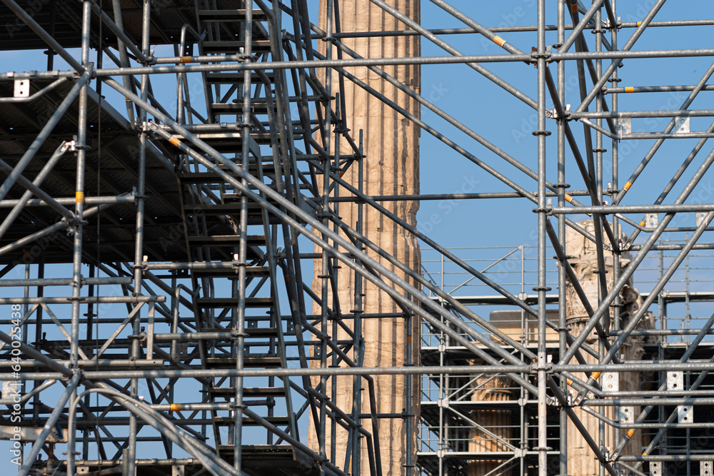 Scaffold covering old restored columns in an archaeology site in Athens, Greece