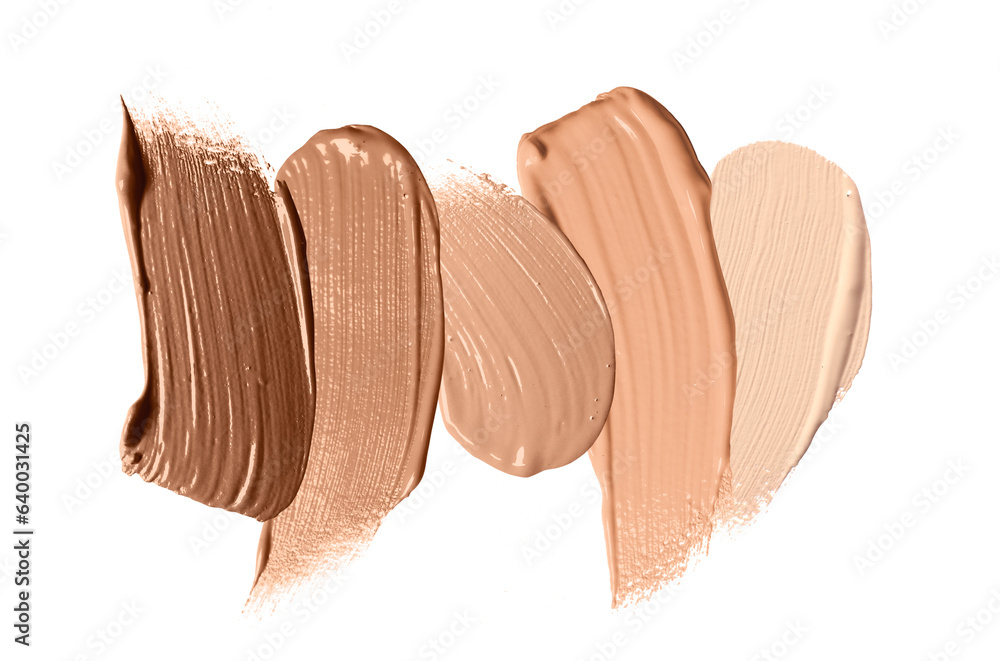 Foundation of various shades for different skin tones isolated on white, top view. Set of samples Foundation of various shades for different skin tones isolated on white, top view. Set of samples