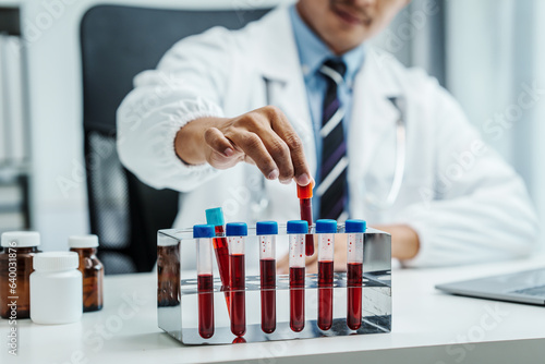 Cuadro en lienzo Clinical Laboratory Tests, Asian hematologist checking medically necessary blood tests