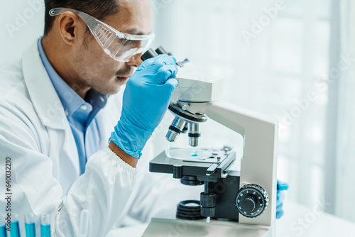 Asian male scientists white coat conducting research investigations medical laboratory, lab bacteria, microbiology laboratory public health, animal health, Aerobes, anaerobes, mycobacteria and fungi