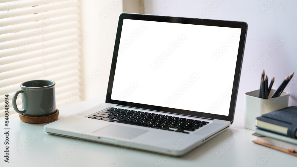 Fototapeta premium Workspace desk and laptop. copy space and blank screen.