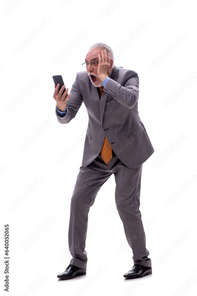 Old businessman talking by phone isolated on white Old businessman talking by phone isolated on white