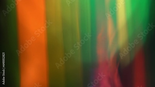 Fast psychedelic movement of multi-colored horizontal stripes changing color and shape. Abstract surreal background. Optical chromatic dispersion