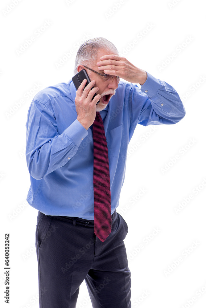 Old businessman talking by phone isolated on white Old businessman talking by phone isolated on white