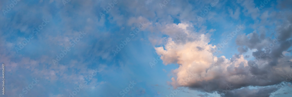 Blue sky fluffy white clouds on summer season bright clear skyline with beautiful cloudscape. Panorama blue sky clouds pattern on daylight with copy space. Cumulus cloudscape air climate sunny day Blue sky fluffy white clouds on summer season bright clear skyline with beautiful cloudscape. Panorama blue sky clouds pattern on daylight with copy space. Cumulus cloudscape air climate sunny day