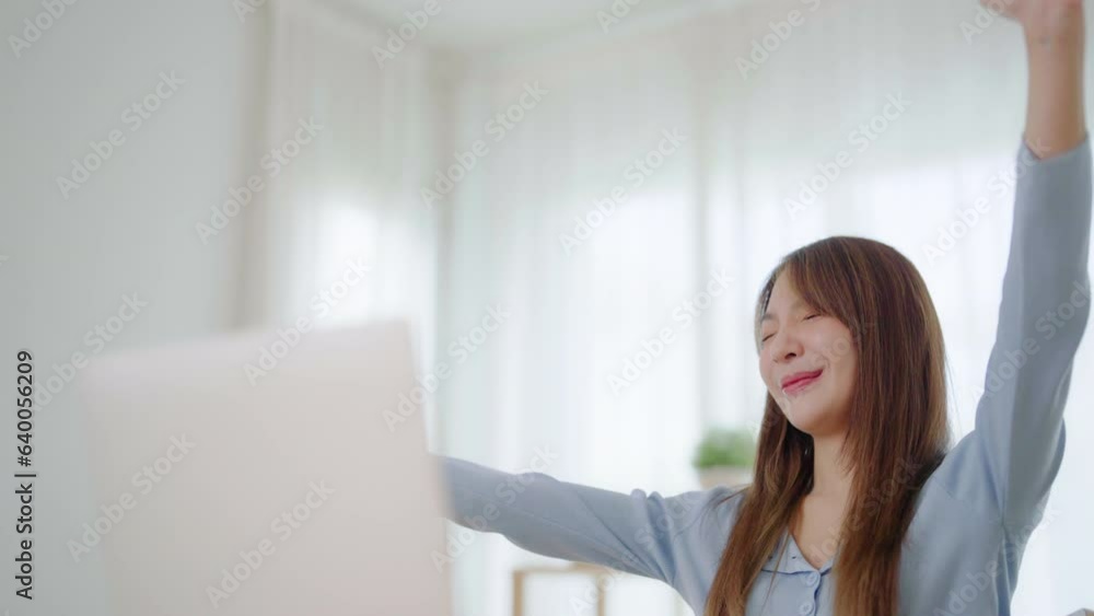 Office syndrome concept. Young asian woman feeling pain in neck and shoulder after working on computer laptop for a long time. She stretches to relax her muscles Office syndrome concept. Young asian woman feeling pain in neck and shoulder after working on computer laptop for a long time. She stretches to relax her muscles
