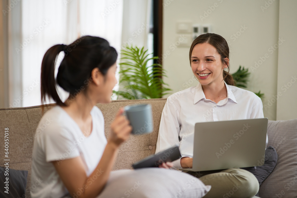 Asian woman working, surfing the internet, staying at home on her day off. Asian woman working, surfing the internet, staying at home on her day off.