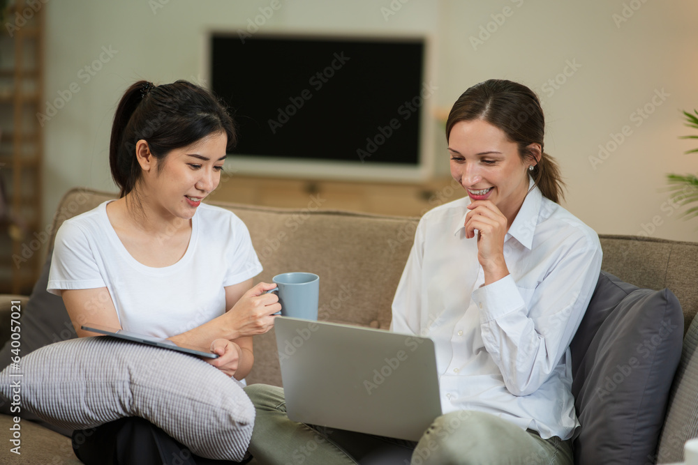 Asian woman working, surfing the internet, staying at home on her day off. Asian woman working, surfing the internet, staying at home on her day off.