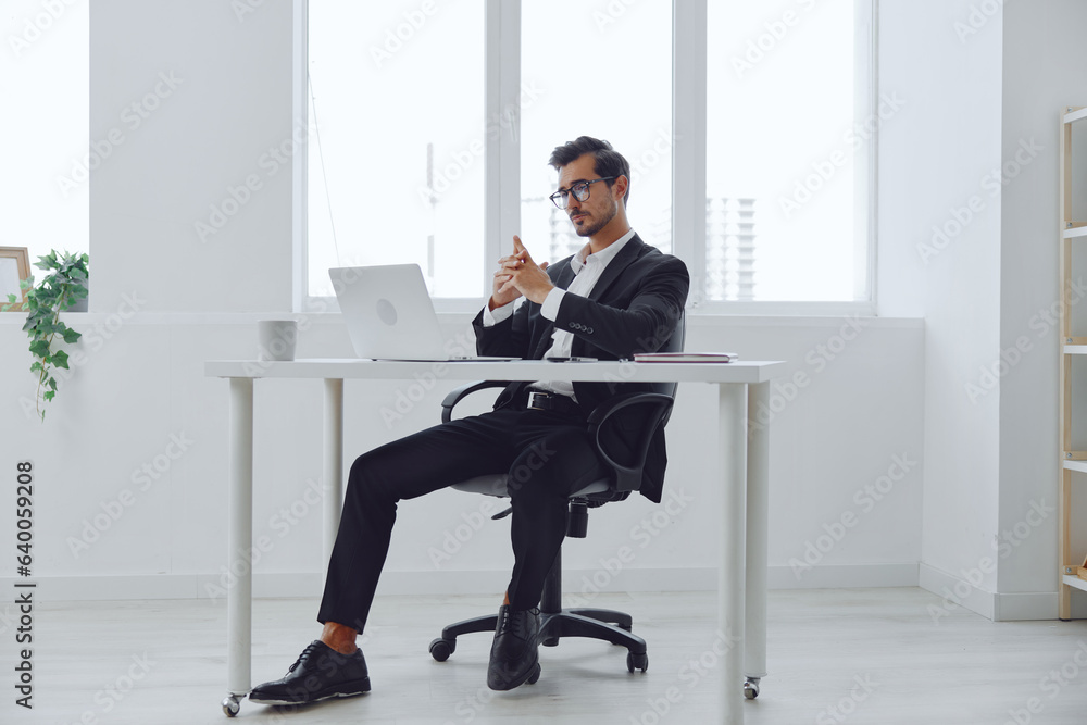 Man glasses laptop working tired office Man glasses laptop working tired office