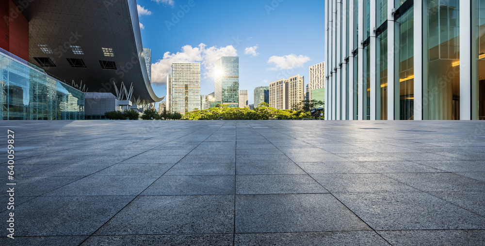 Empty square floors and modern city buildings in Shenzhen, Guangdong Province, China. Panoramic view.