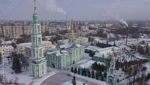 Winter view from a drone of the Spaso-Preobrazhensky Cathedral in the city center and residential areas in Tambov, Russia. photo