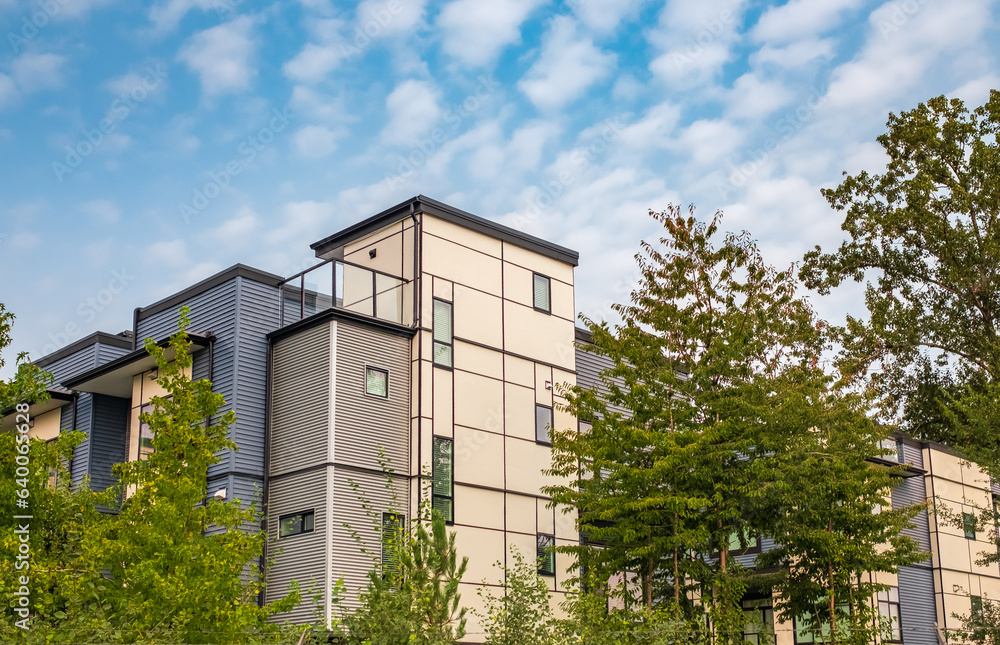 Brand new apartment building on summer. Canadian modern residential architecture. Modern complex of apartment buildings