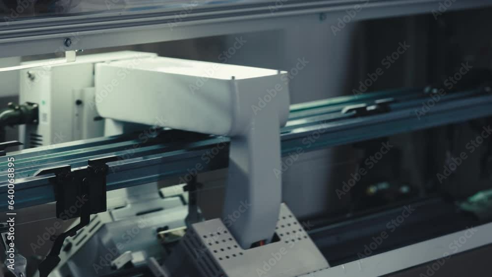 Printer that Prints on Clothes. Printing on Factory. Printer Machine. Sewing Factory Concept Printer that Prints on Clothes. Printing on Factory. Printer Machine. Sewing Factory Concept