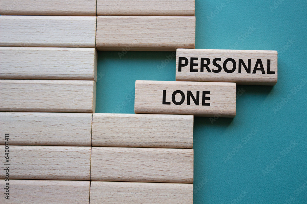 Personal Loan symbol. Concept word Personal Loan on wooden blocks. Beautiful grey green background. Business and Personal Loan concept. Copy space Personal Loan symbol. Concept word Personal Loan on wooden blocks. Beautiful grey green background. Business and Personal Loan concept. Copy space