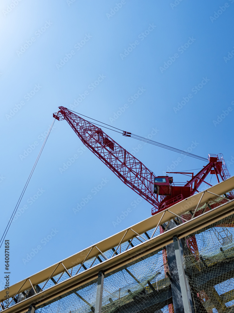 A tall building under construction. A tall building under construction.