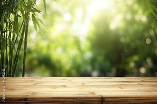 Empty wooden desk with bamboo forest background