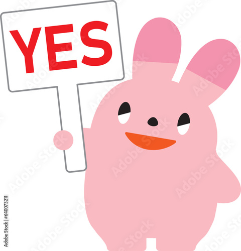 赤い文字のYESのプレートを持ったうさぎ