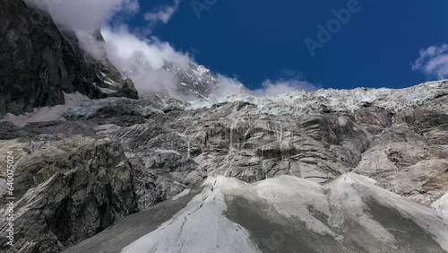 Drone shot, drone video, drone flight, aerial view, flight over a snowfield and a glacier at the foot of Mont Blanc, mountain panorama, blue sky, summer, clouds, Alps, Valle Aosta, Italy, Europe