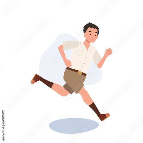  Active School Life concept. Young Thai Student boy in Uniform Running with Joy.