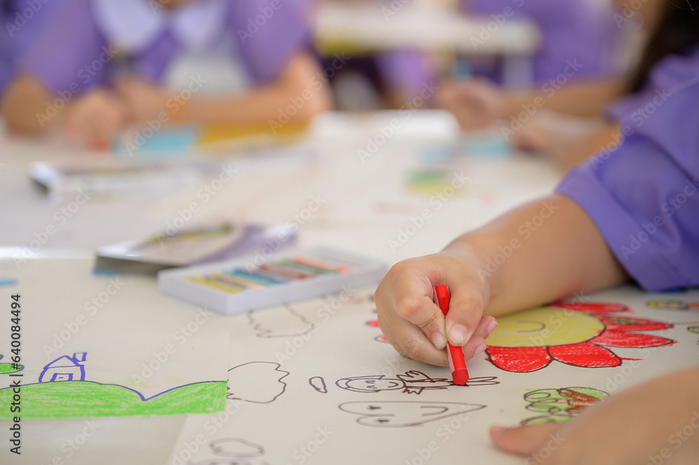 Children and friends paint with their own creativity in colorful colors in kindergarten class in school. Children paint water or crayons on drawing paper. Children and friends paint with their own creativity in colorful colors in kindergarten class in school. Children paint water or crayons on drawing paper.
