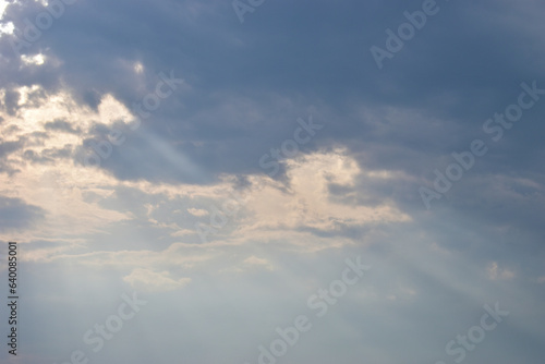 beautiful blue sky and cloud with golden ray sunrise in the morning, natural background © sutichak