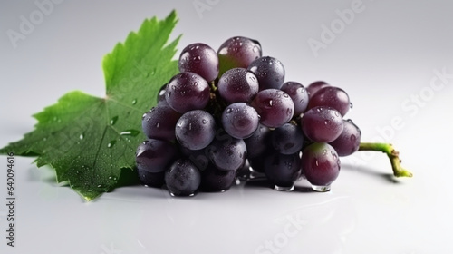 Isabella  grapes with leaves on grey white background  photo