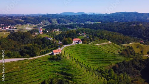 Stunning aerial 4K drone footage of Haloze, Slovenia. It is a picturesque region in northeastern Slovenia known for its rolling hills, lush vineyards, and rich cultural heritage. Filmed in the summer. photo