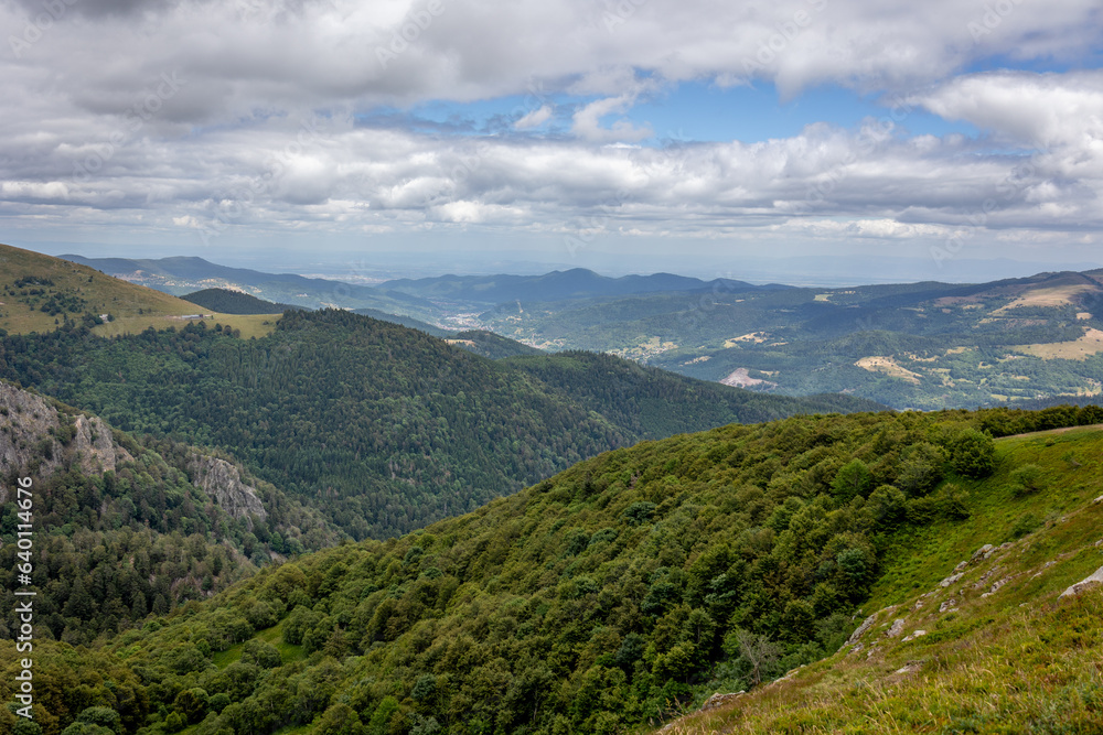 Landscape photo of the mountainous and hilly environment of the French Vosges region of Haut-rhin, taken close to the mountain named 'Grand Ballon' Landscape photo of the mountainous and hilly environment of the French Vosges region of Haut-rhin, taken close to the mountain named 'Grand Ballon'