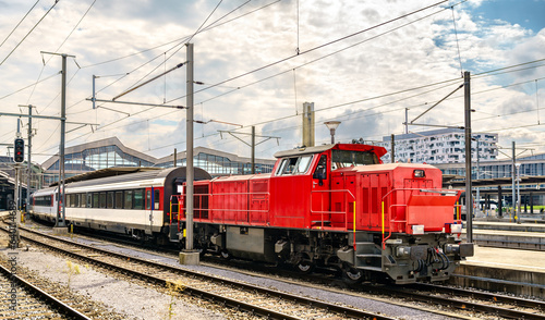 Switcher locomotive with passenger wagons at Basel Station in Switzerland © Leonid Andronov