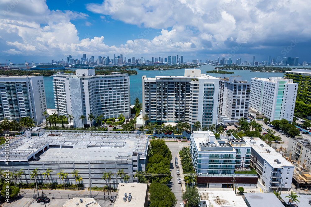 Miami Beach, Florida, USA - Aerial of Luxury mid-rise condominium at South Beach facing Biscayne Bay and the downtown Miami skyline.