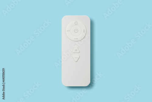 white remote control panel with sky blue background