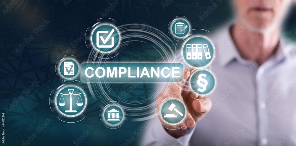 Man touching a compliance concept Man touching a compliance concept
